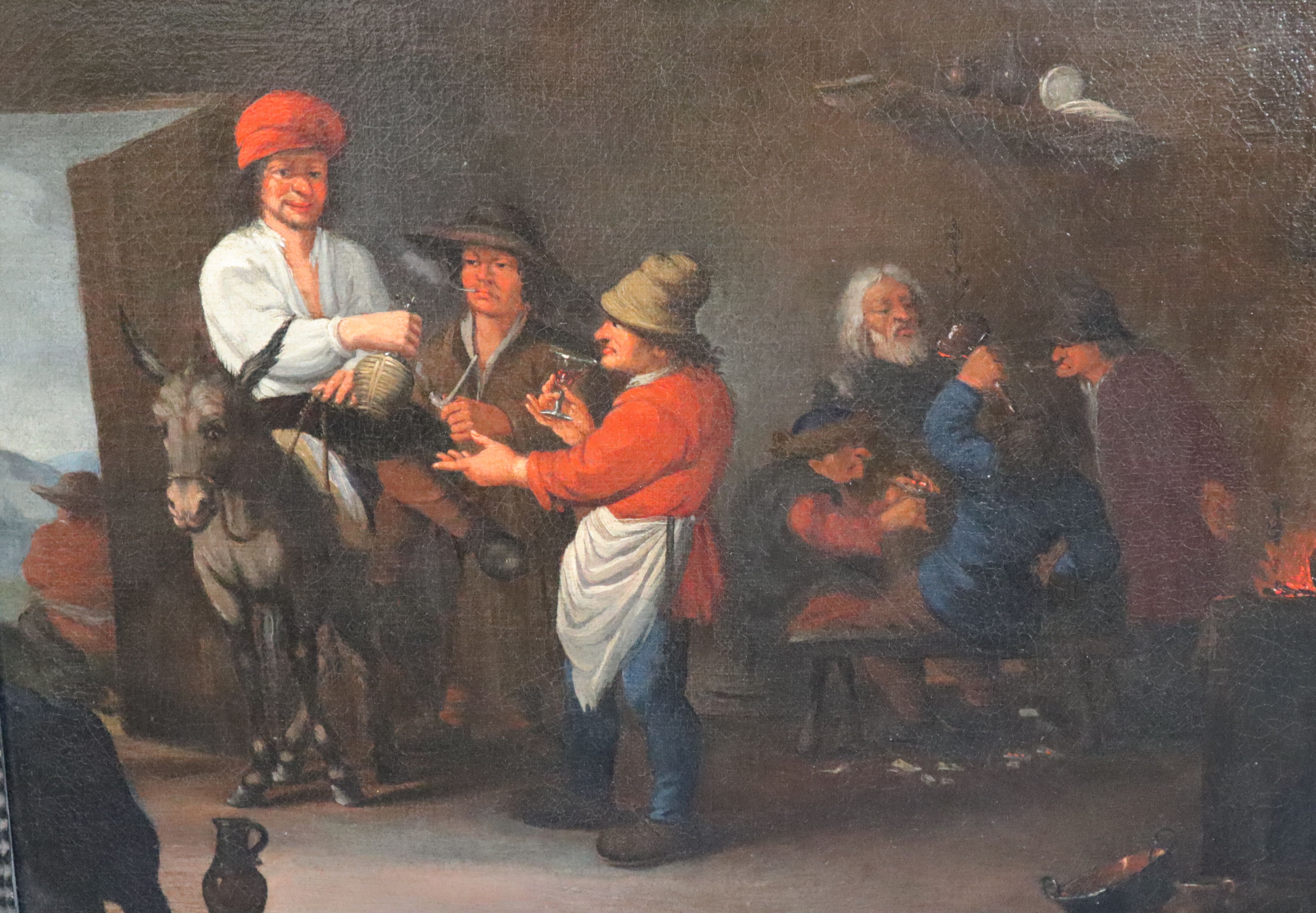 Follower of Peter Quast (Dutch 1606-1647) Peasants drinking and smoking in an interior 12.5 x 17.25in.